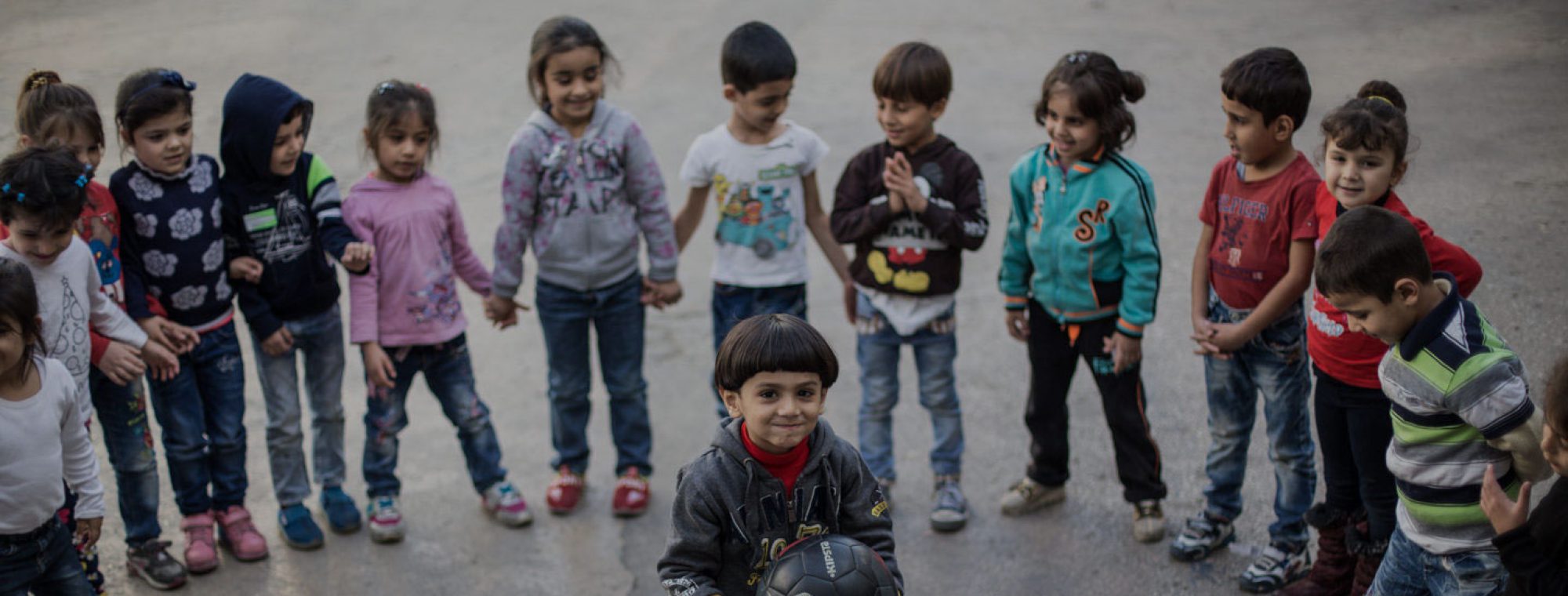 Refugee children playing at a JRS school in Lebanon. (Kristóf Hölvényi/Jesuit Refugee Service)